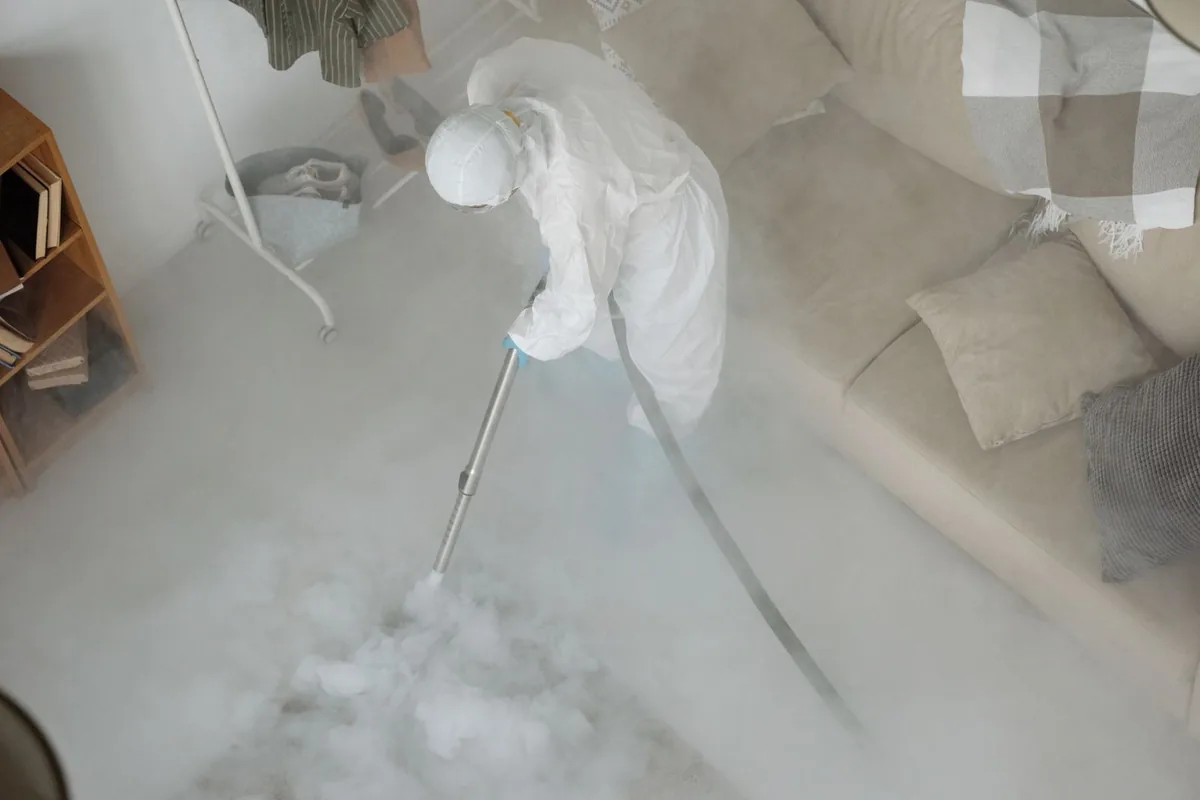 Biohazard cleanup technician in protective equipment, Cascade Valley, WA